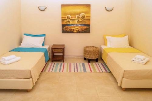 Две роскошные виллы Доминика 2 с 5 спальнями Недвижимость Пелопоннес (Греция)   Услуги (включены в стоимость арендной платы): смена белья и полотенец — 2 раза в неделю