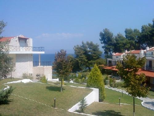 Греция Халкидики-Кассандра Таунхаус 126 кв м на 1-й линии моря Недвижимость Nomos Chalkidikis (Греция)  на 1-й линии моря